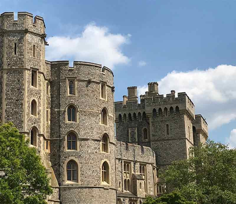 Windsor Castle Exterior stone walls and round tower.